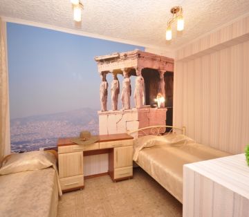 Спальные места, тумба в номере «Римский» отель Прибой Саки
